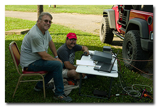 Jeramy Duncan, KC8QDQ, and Brian Taylor, ZK8U, at the satellite station -- click to enlarge