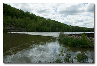 The Muskingum River flows over the dam