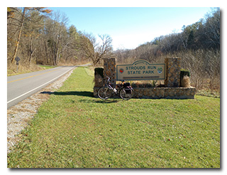 The Strouds Run State Park sign