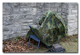 Eric operating under an improvised shelter -- click to enlarge