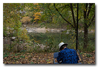 Eric operating, with the nearby river visible in the background -- click to enlarge