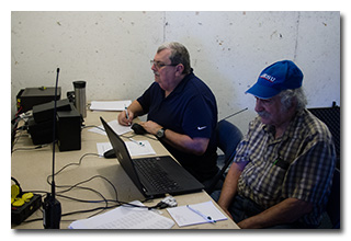 Jeff Slattery, N8SUZ, operates HF CW while Bob Curtis, KD8FRQ, logs -- click to enlarge