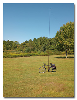 The mast and antenna supported on the bicycle