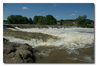 The Muskingum River roars over the dam, viewed from the Malta side of the river