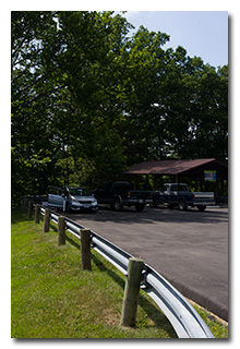 Eric's station, the car being dwarfed by pickup trucks -- click to enlarge