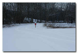 Unplowed FR1 leading to Penrod Lake -- click to enlarge