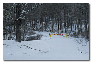 Snow-covered and gated Forestry Road 1 toward Eric's preferred operating location -- click to enlarge