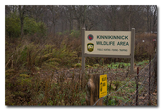 The Kinnikinnik Wildlife Area sign