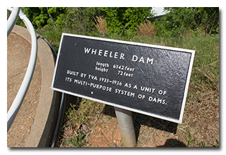 the Wheeler Dam sign