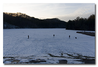 Walkers on a frozen Dow Lake