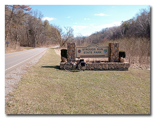 The Strouds Run State Park sign